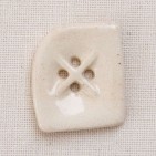 Irregular shape ceramic button